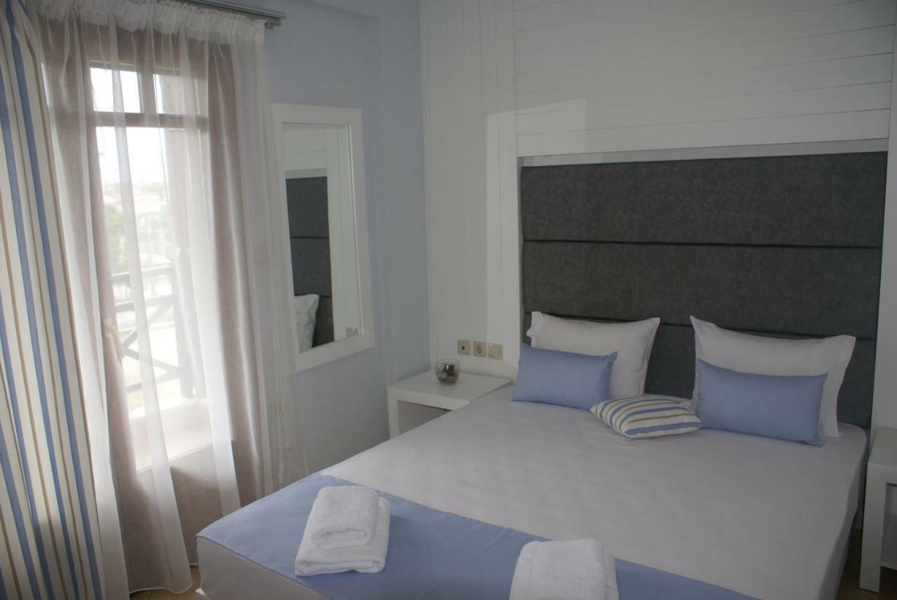 Nostos Rooms Амолиани Экстерьер фото